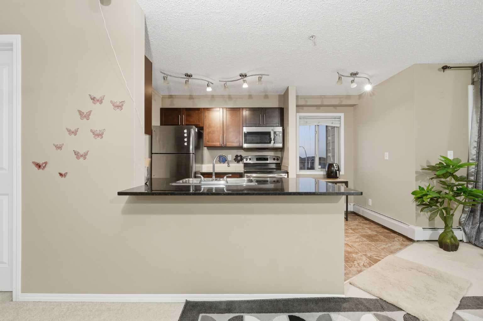 301, 15 Saddlestone Way NE