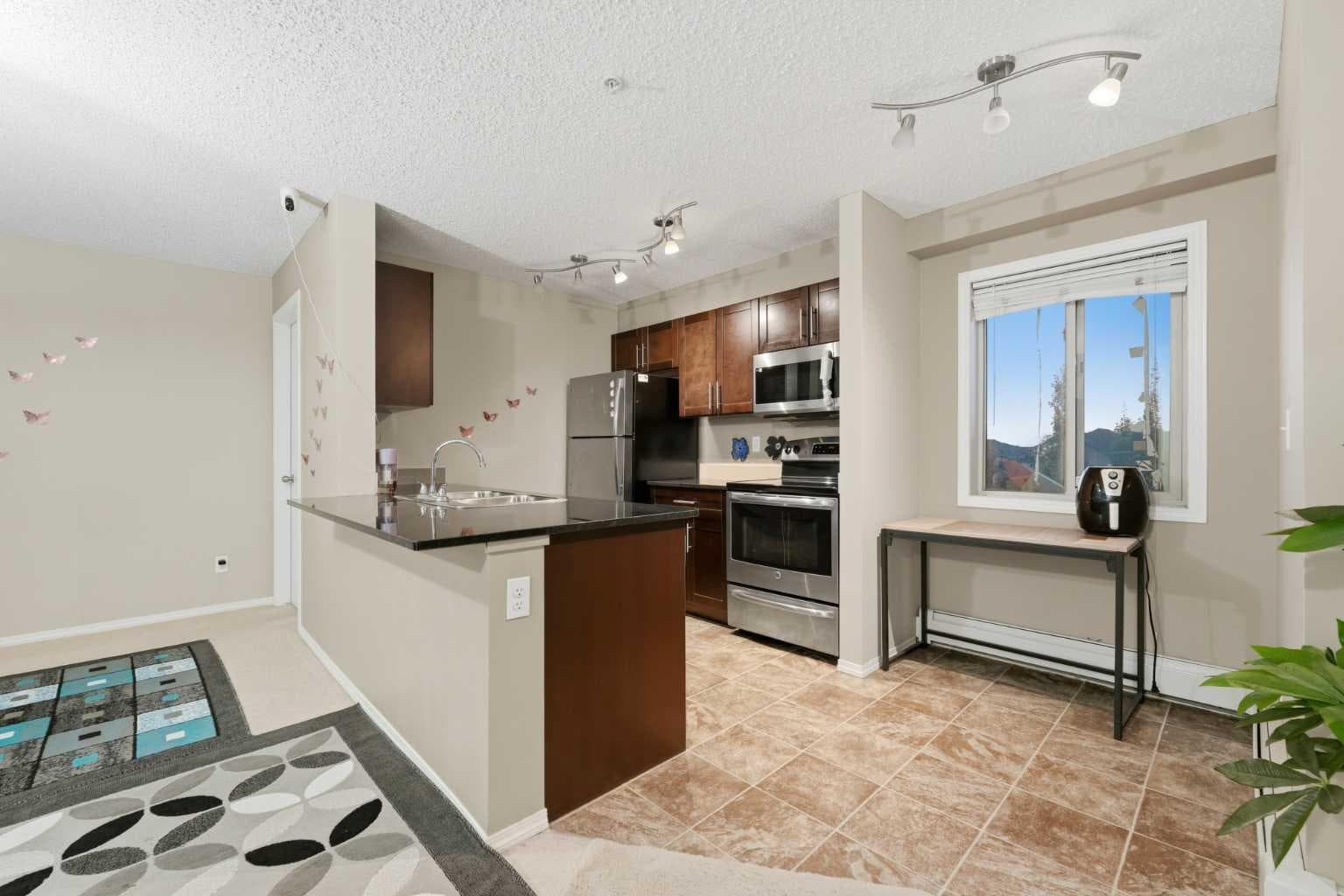 301, 15 Saddlestone Way NE