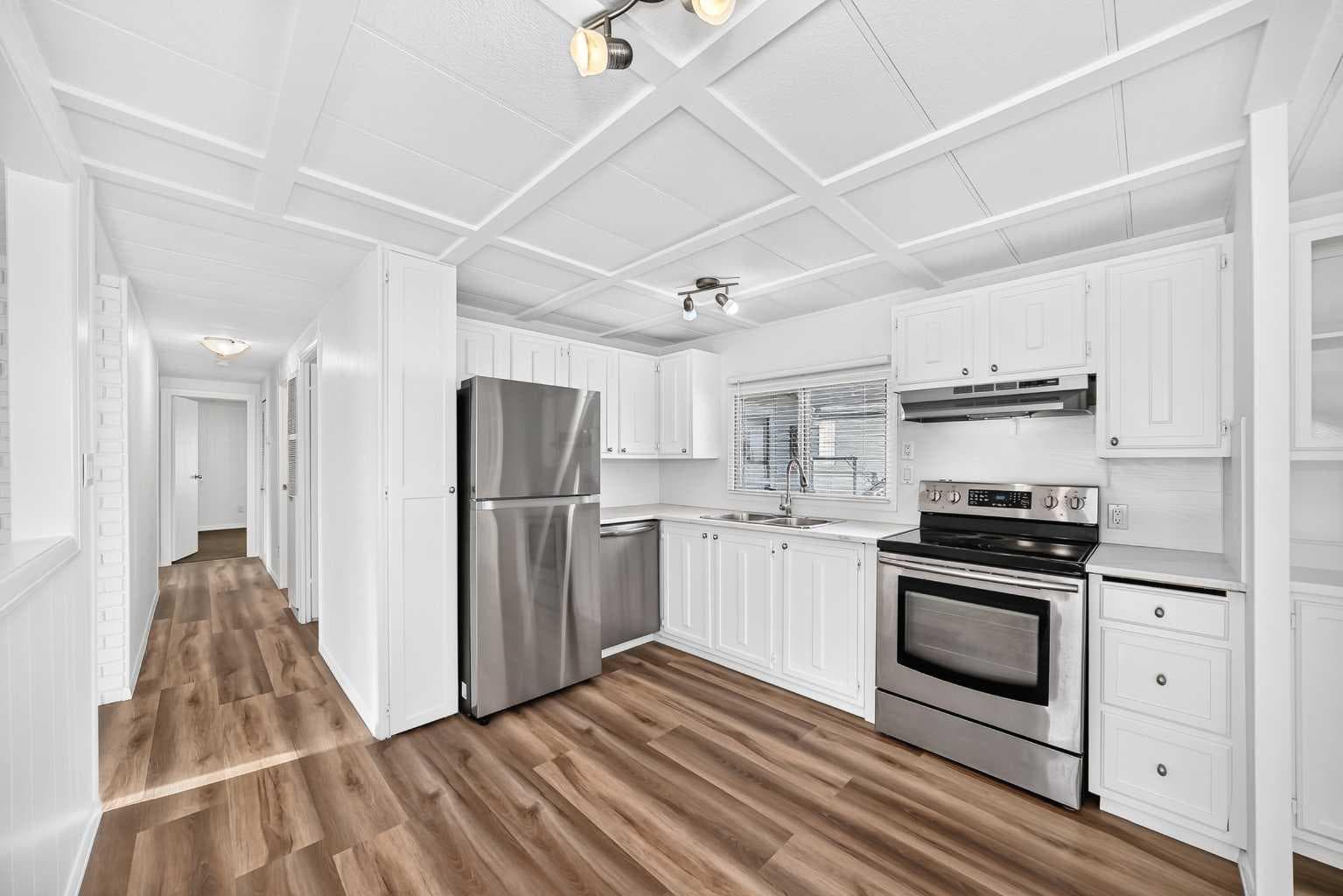 303, 99 Arbour Lake Road NW