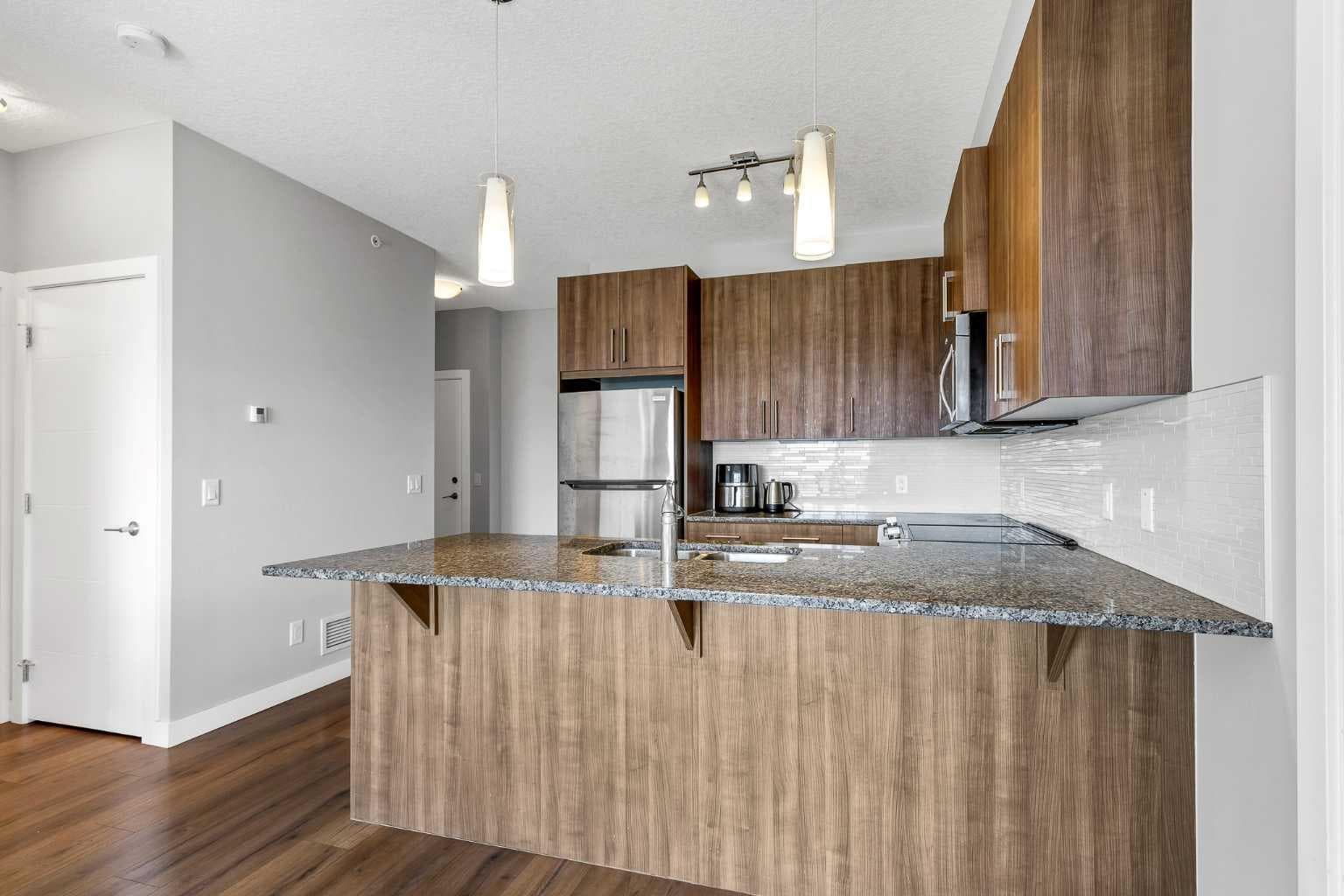 302, 20 Sage Hill Terrace NW